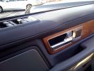Drivers door panel with extended leather.jpg