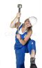 3118735-studio-photography-of-a-blond-girl-dressed-in-a-blue-boilersuit-with-a-big-hammer-isolated-on-white.jpg